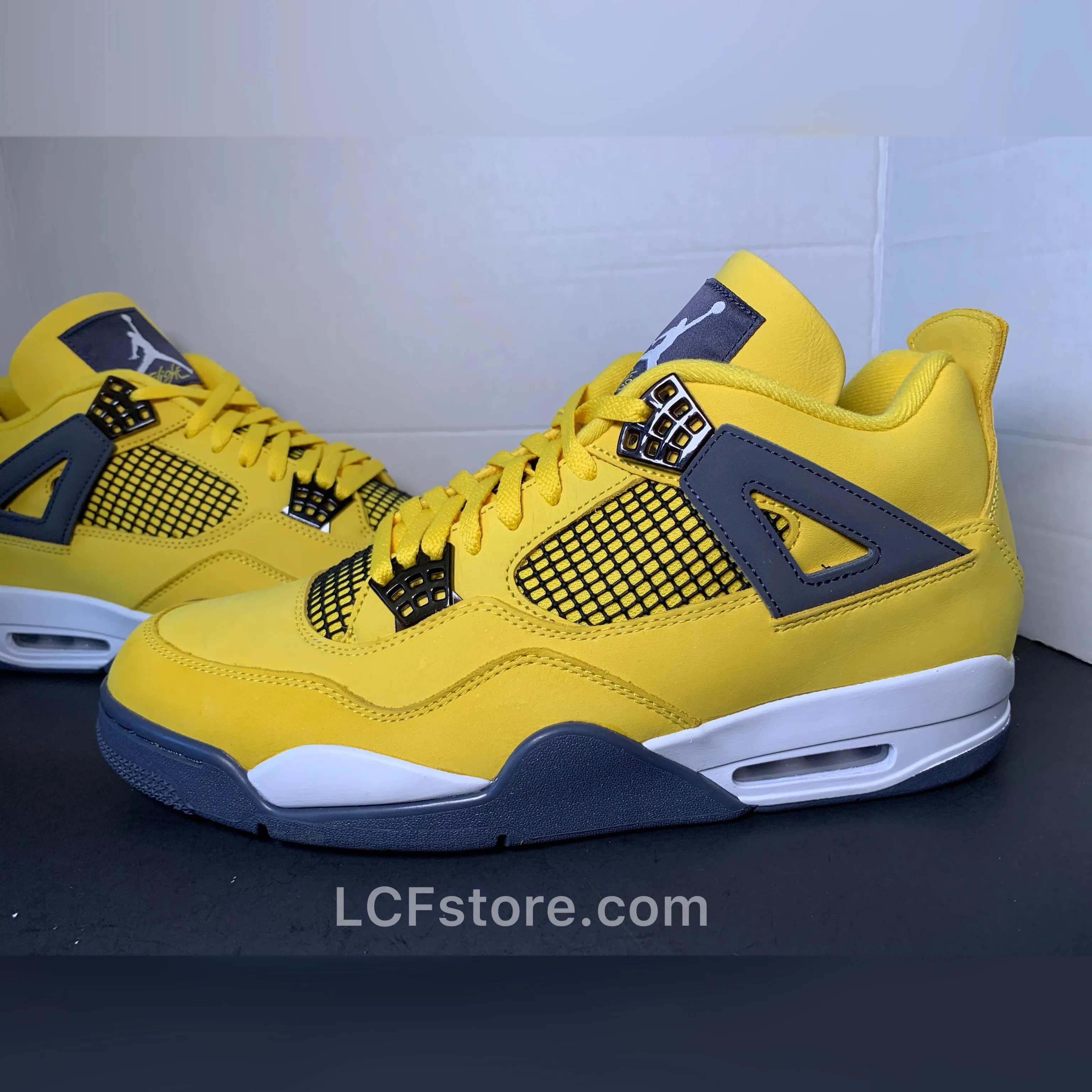 Nike Air Jordan 4 Retro "Lightning" Asics Versablast 2 Running Shoes